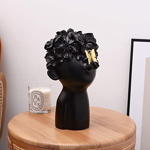 Notakia Black Resin Sculpture with Metal Butterfly