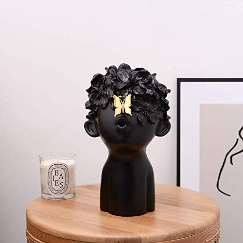Notakia Black Resin Sculpture with Metal Butterfly