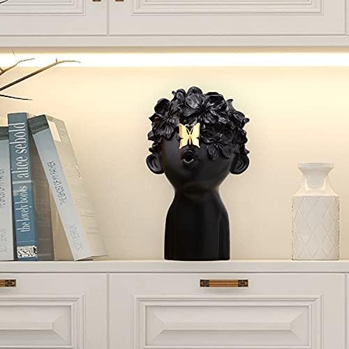 Notakia Black Resin Sculpture with Metal Butterfly