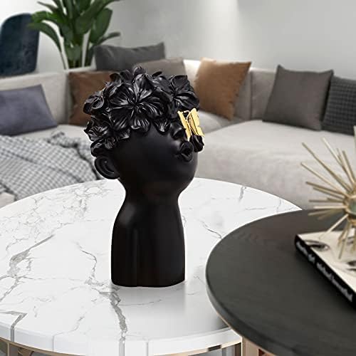 Notakia Black Resin Sculpture with Metal Butterfly