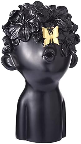 Notakia Black Resin Sculpture with Metal Butterfly