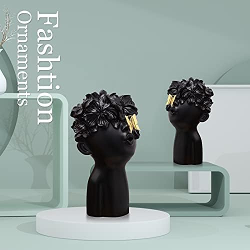 Notakia Black Resin Sculpture with Metal Butterfly